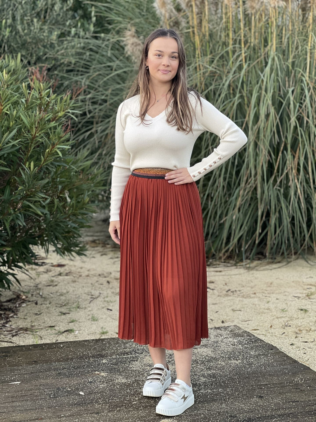 The Pleated Midi Skirt