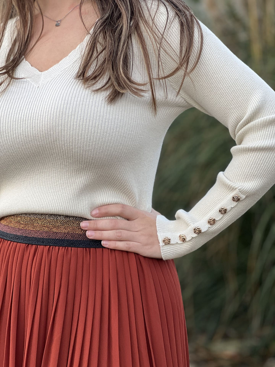 The Pleated Midi Skirt