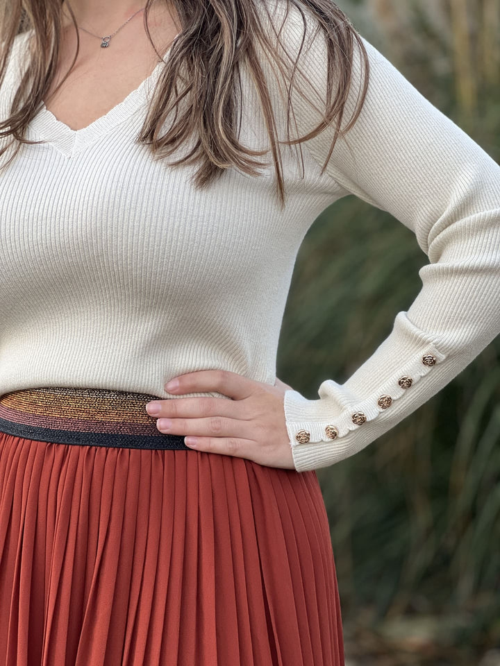 The Pleated Midi Skirt