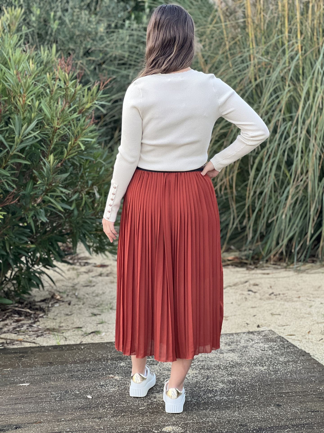 The Pleated Midi Skirt
