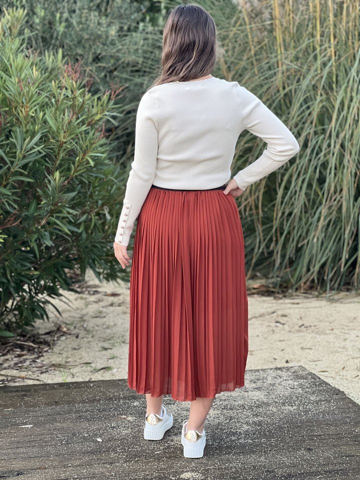 The Pleated Midi Skirt